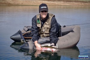 Warren releasing a trout